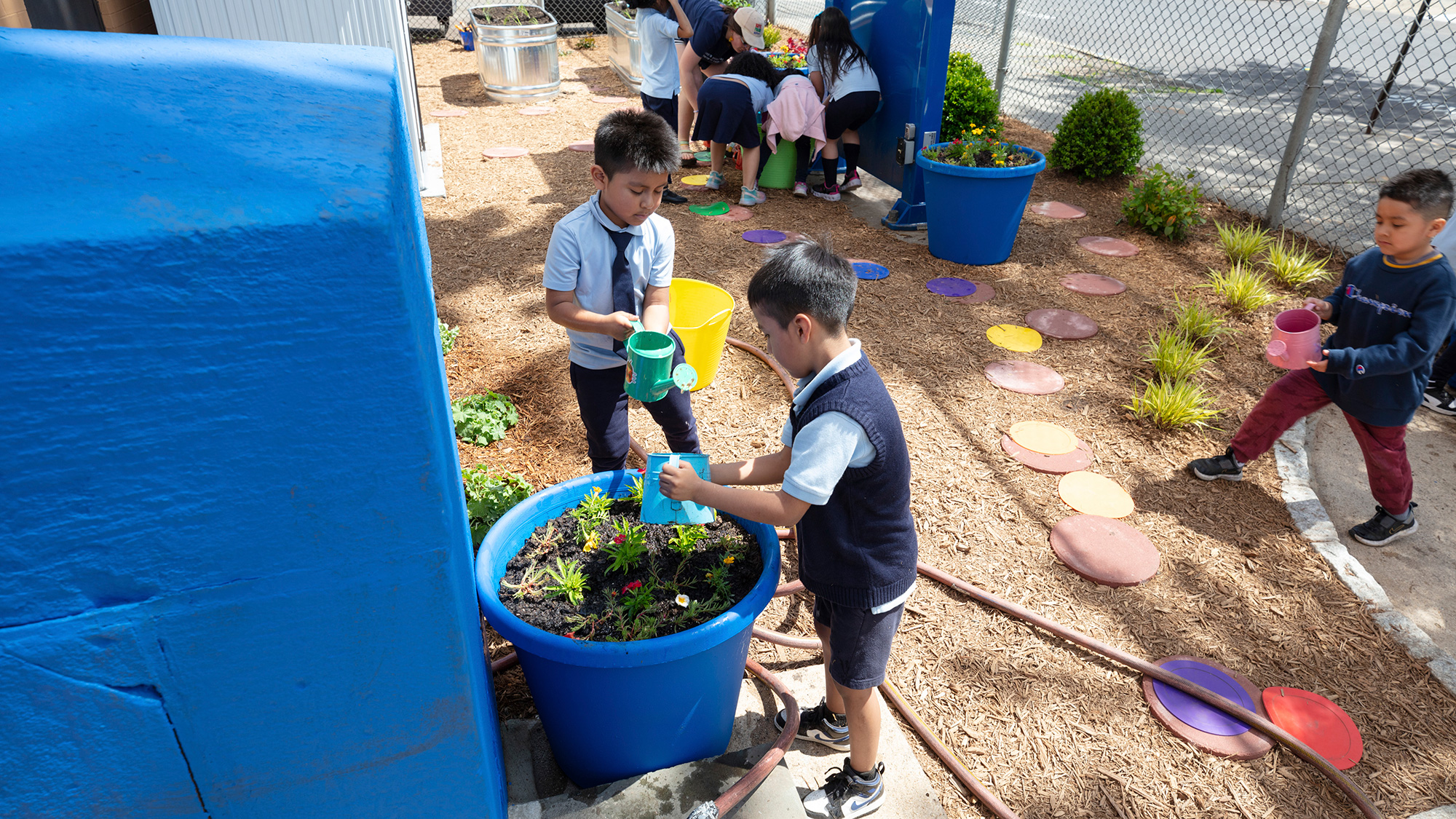 Children playing in a garden.