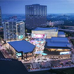 A city with a large crowd of people and buildings.