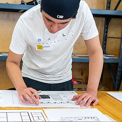 Design Your World summer program student working on project