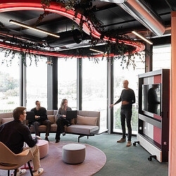 Henkel office collaboration space with floor-to-ceiling windows