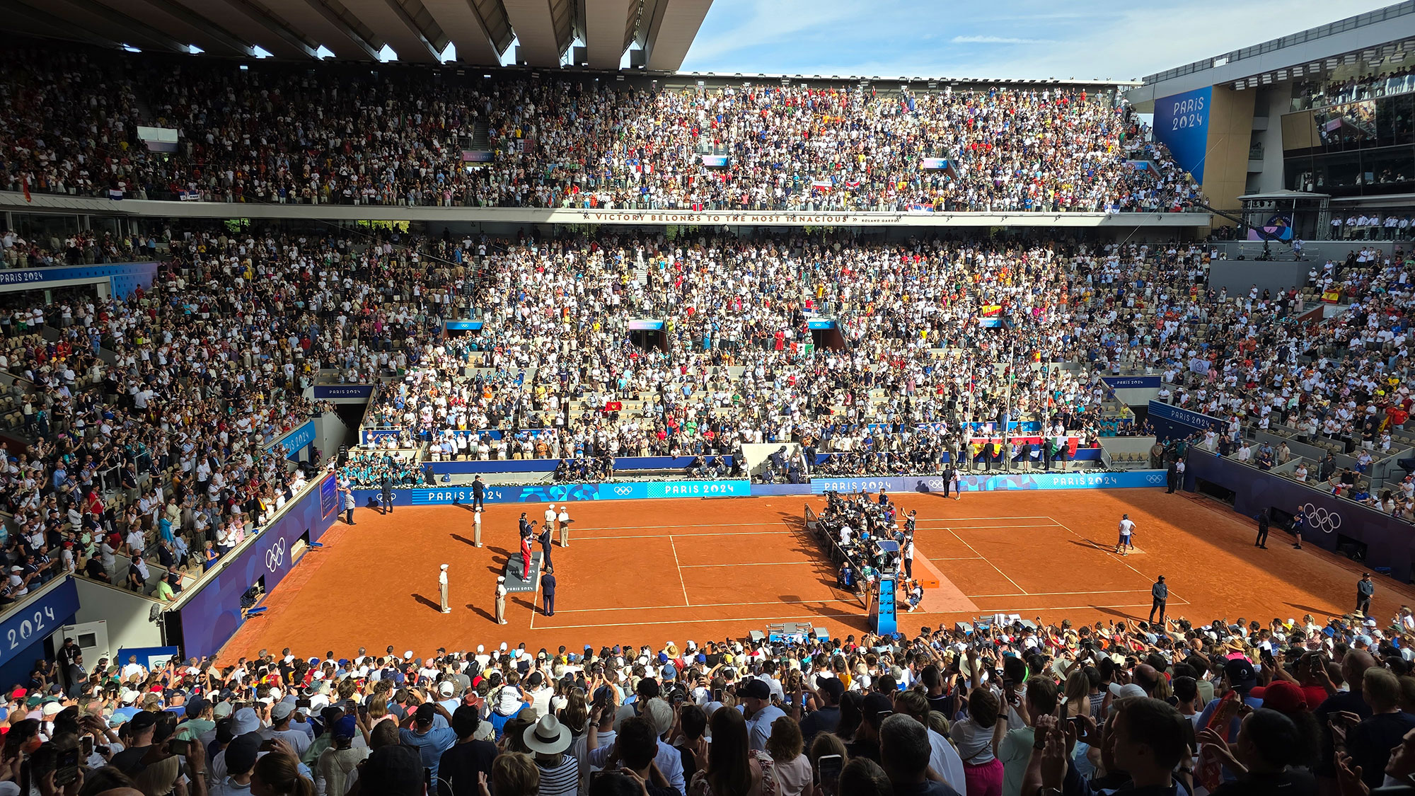 A basketball game in a stadium.