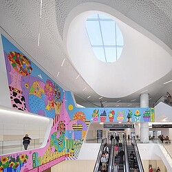 SFO Terminal 1 with wall mural and escalators
