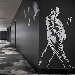 Star Cinema Grill hallway with Hitchcock film-inspired wall graphic