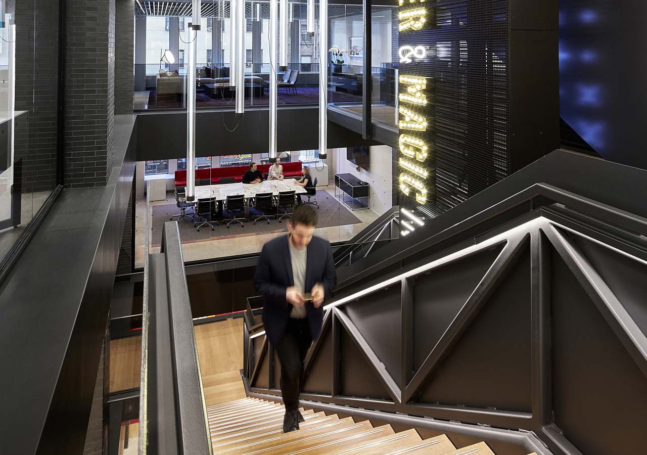 A person walking up a flight of stairs.