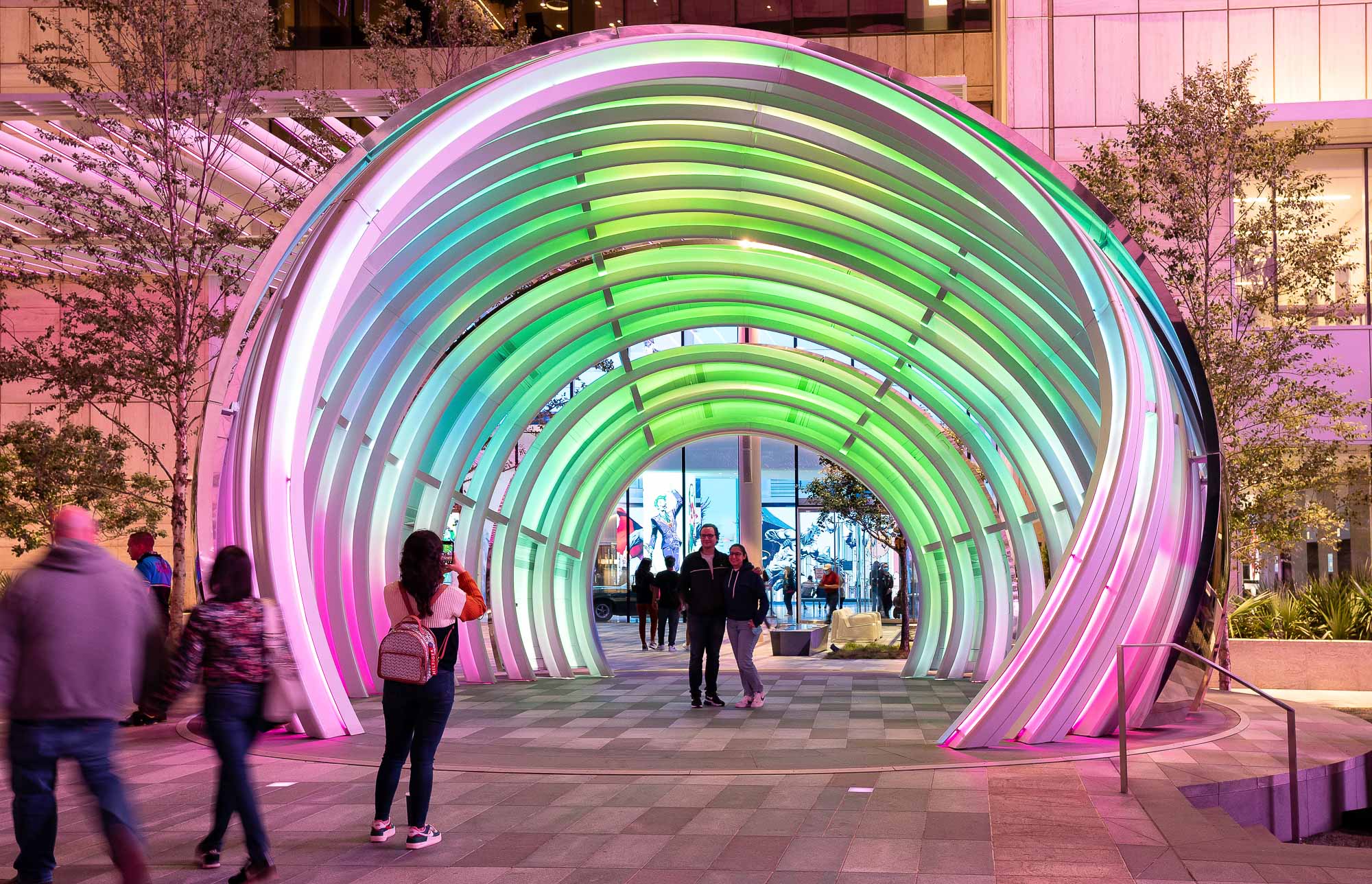 AT&T Discovery District globe installation with bright pink, blue, green colors