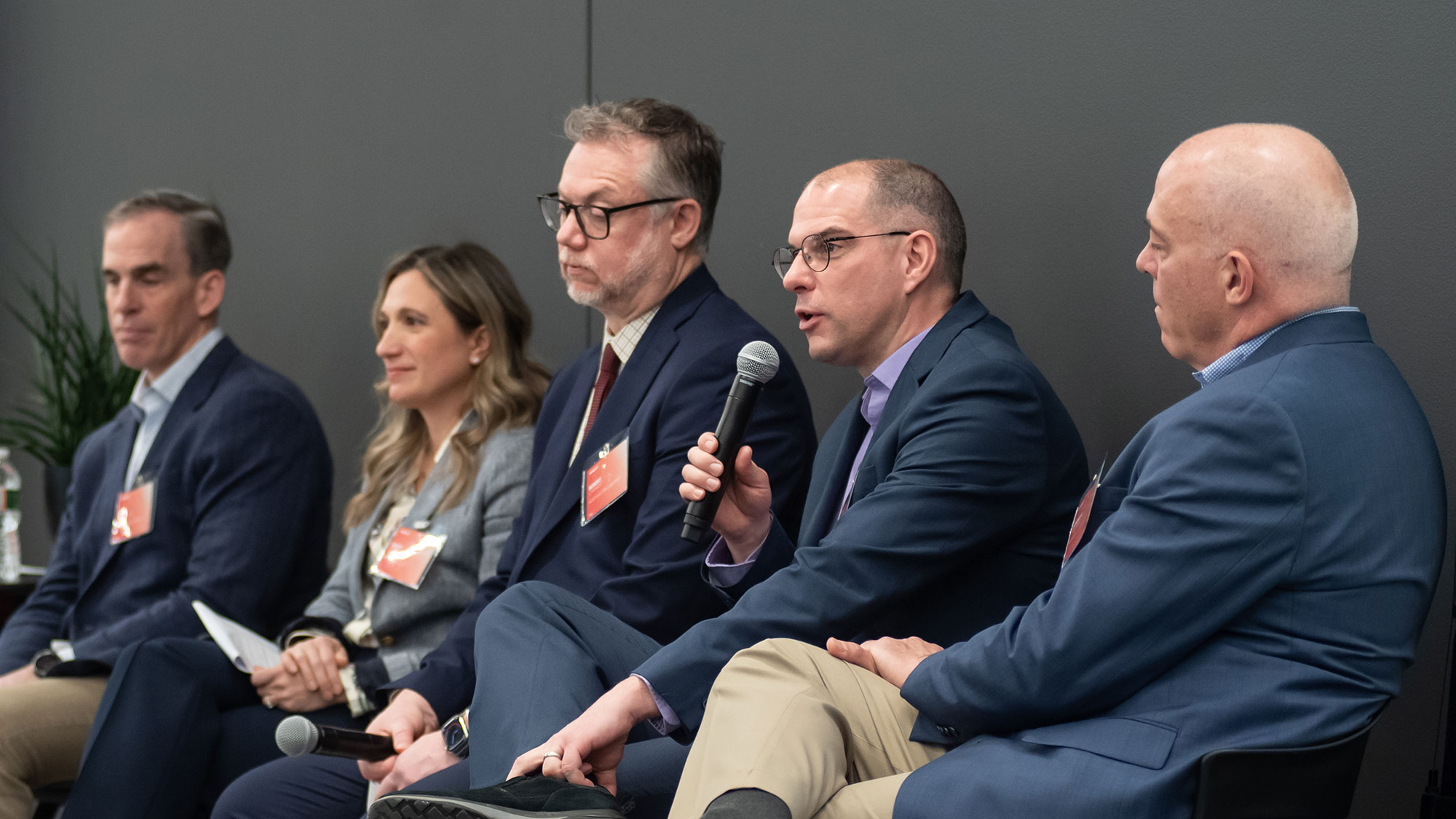 A group of people sitting and talking.