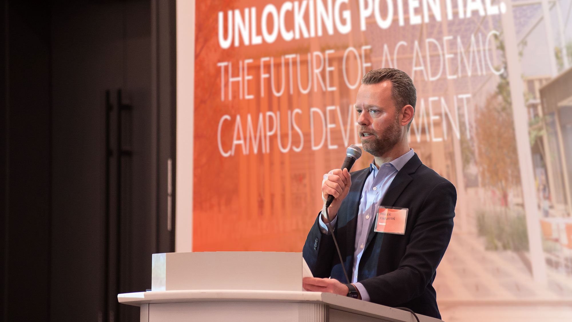 A man speaking into a microphone.