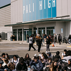 Students sitting outside Palisades High School. Credit: The New York Times.