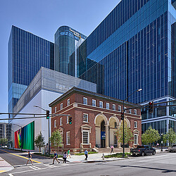 A large building with glass windows.
