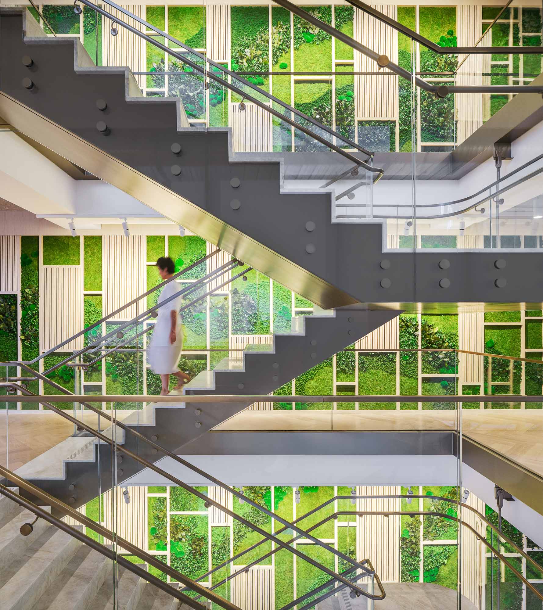 A person walking up a staircase.