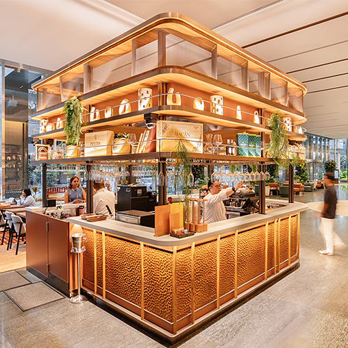A bar with a large display of glass and wood.