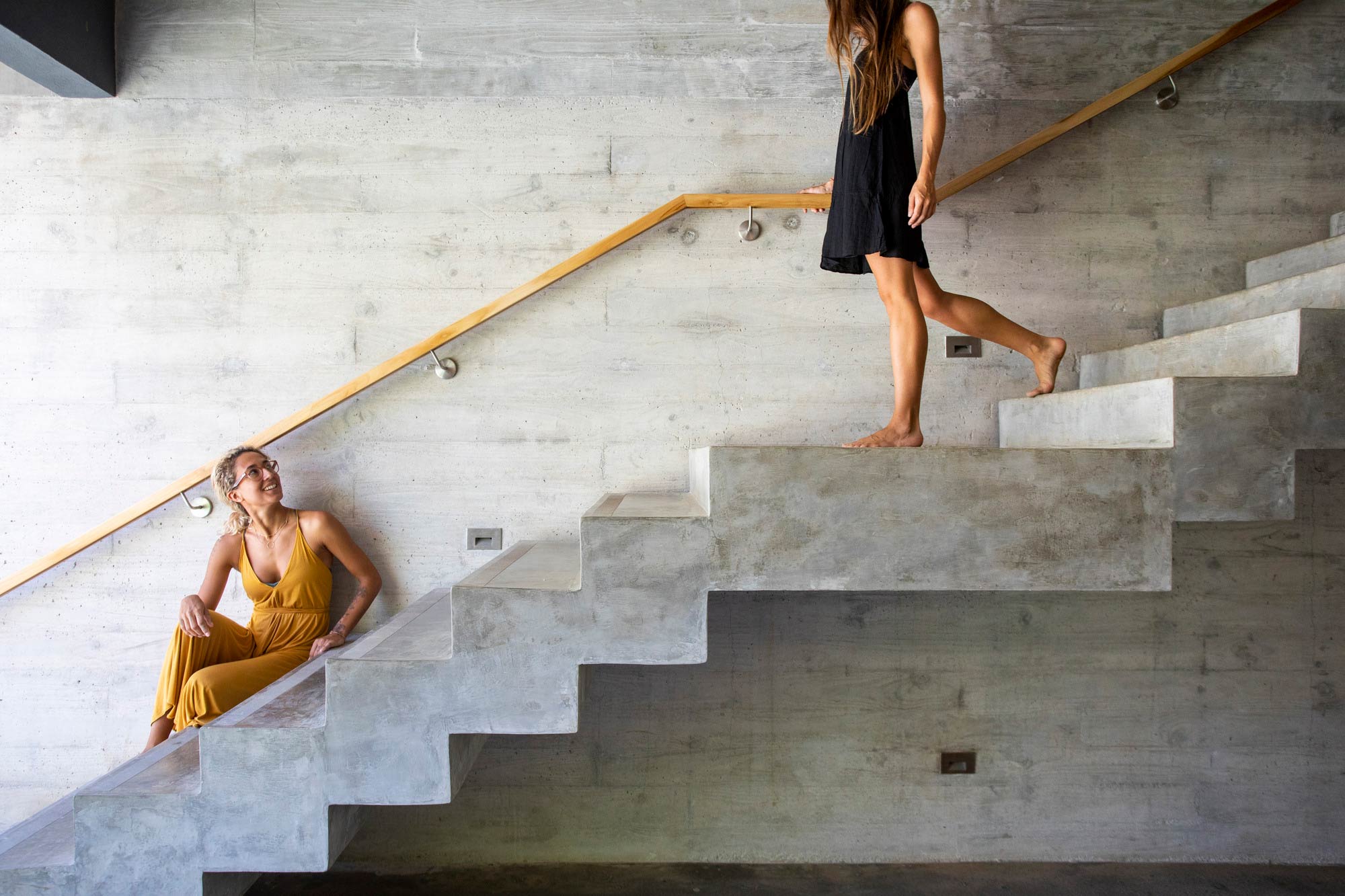 A person sitting on stairs.
