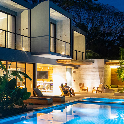 Surf Simply Resort poolside at night