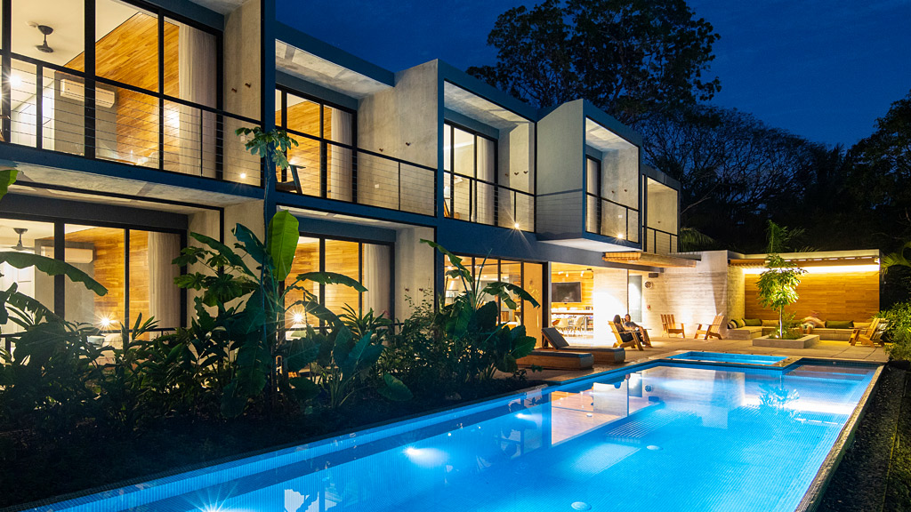 Surf Simply Resort poolside at night