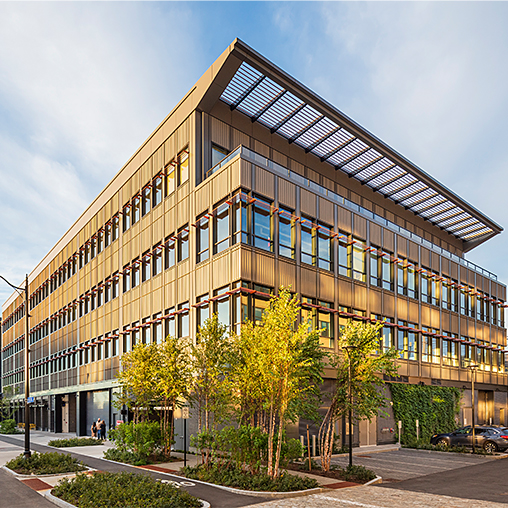 A building with trees in front of it.