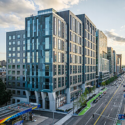 A tall building with many windows.