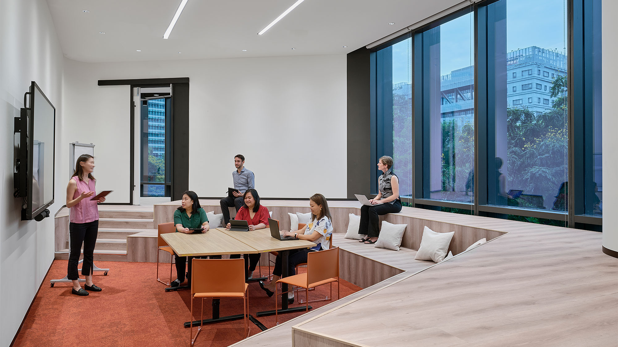 A group of people in a room.