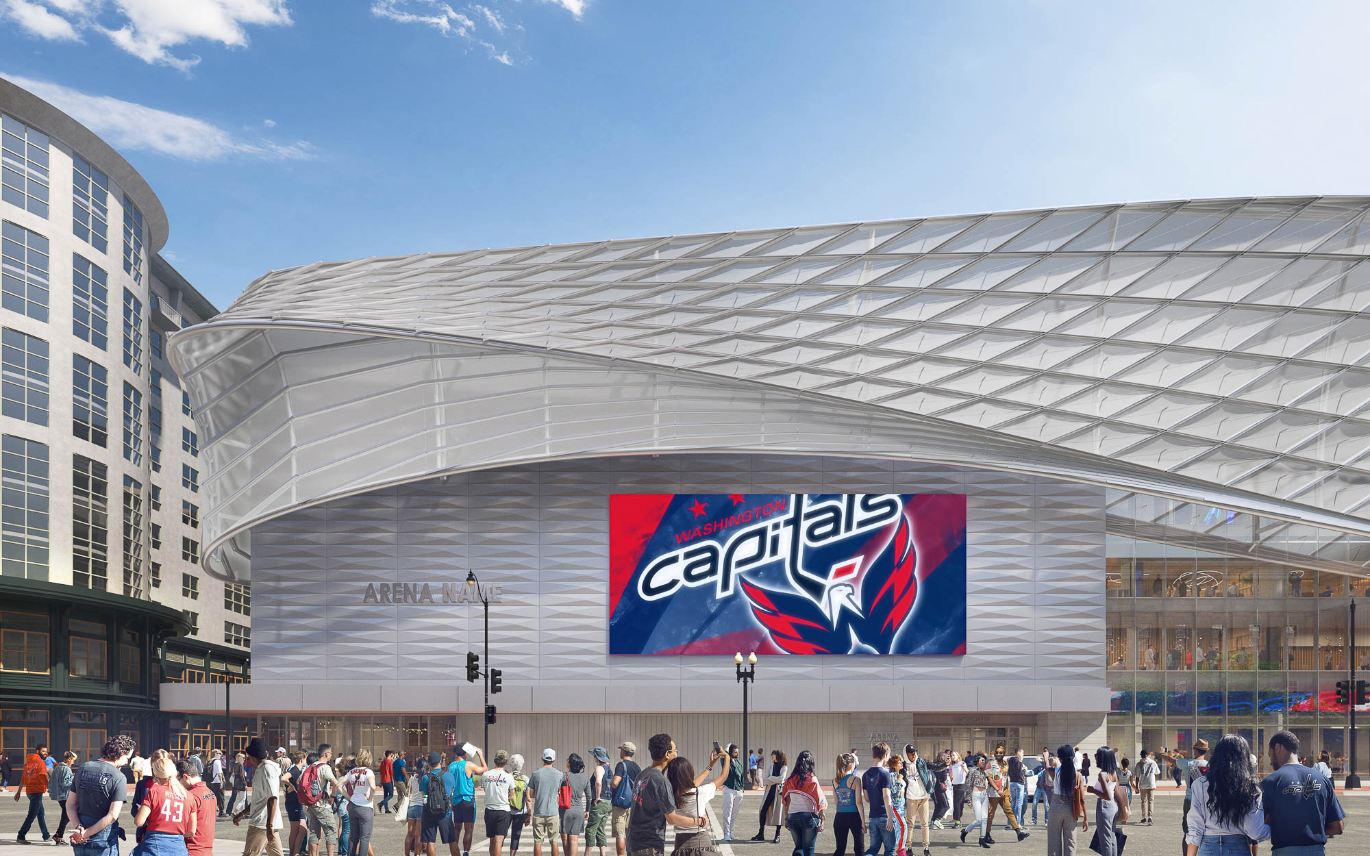 A crowd of people outside of a stadium.