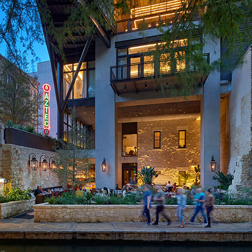 A group of people walking outside of Canopy San Antonio.