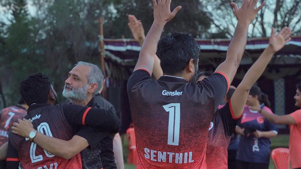 Gensler Premier League members celebrating a cricket match win