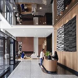 A person walking through a building.