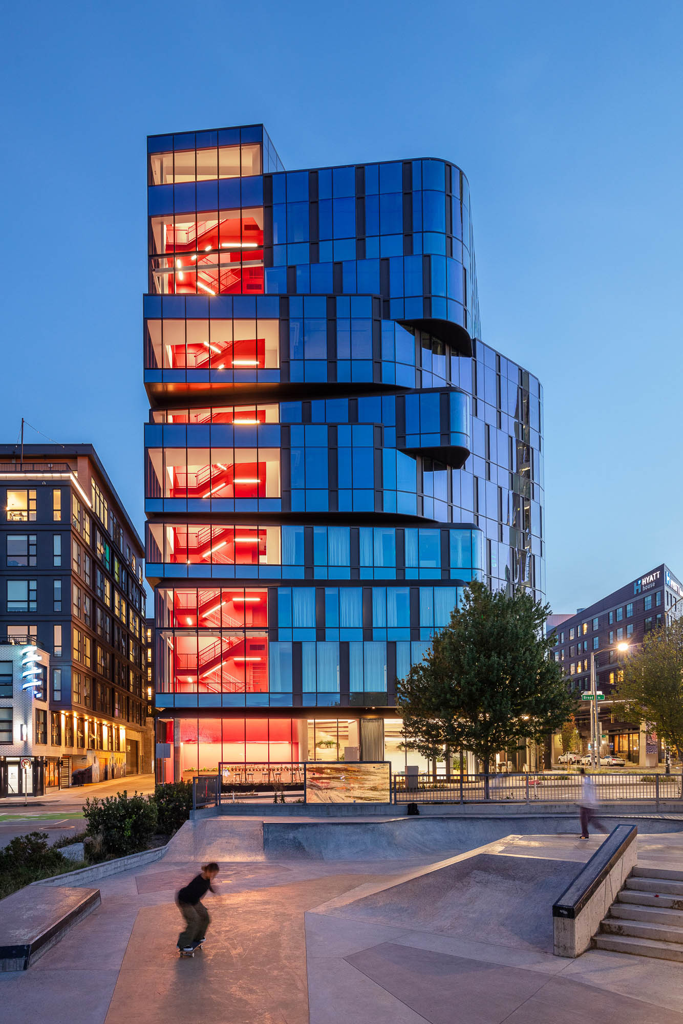 A building with a glass front.