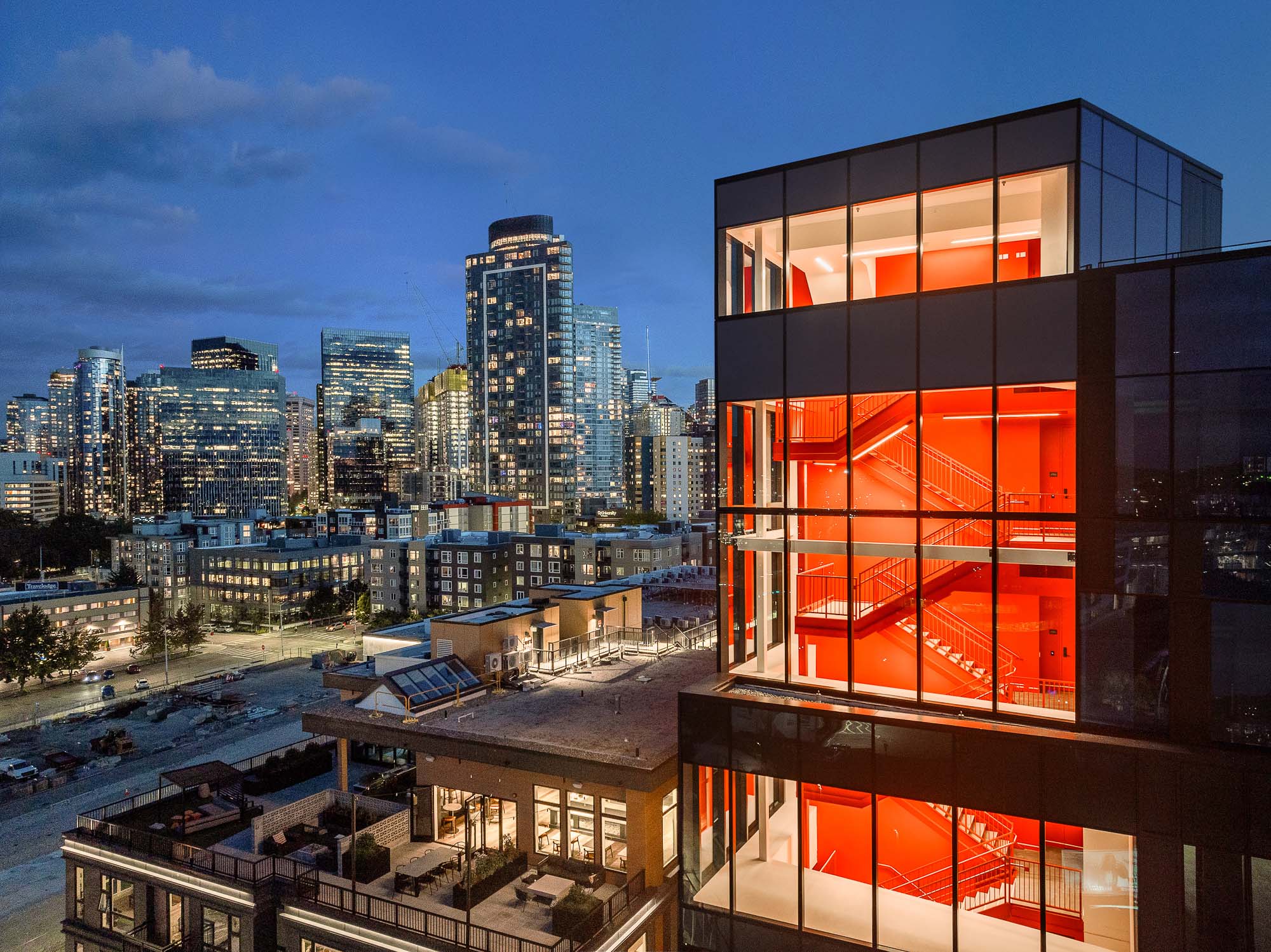 A building with a city in the background.