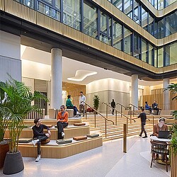 People sitting and working in The Acre.