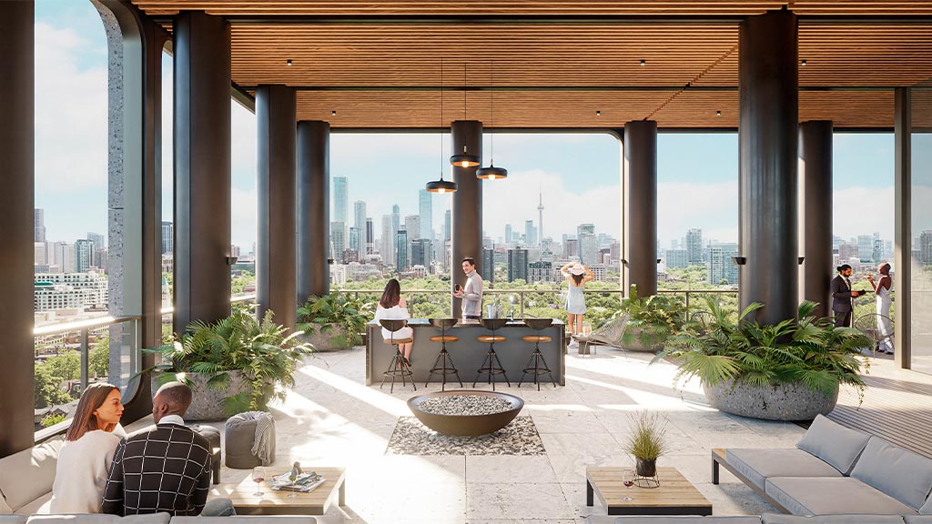 A group of people on the rooftop of the converted office to residential building at 1St. Clair West.