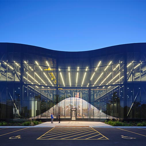 The glass facade of the Ironworker's Training Center.