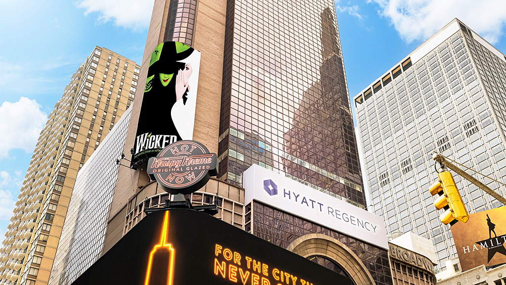 A large building with a sign on it.