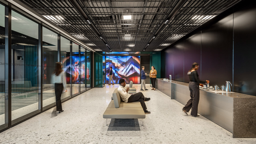AllianceBernstein at Hudson Yards workplace with digital wall