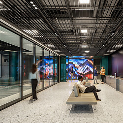 AllianceBernstein at Hudson Yards workplace with digital wall