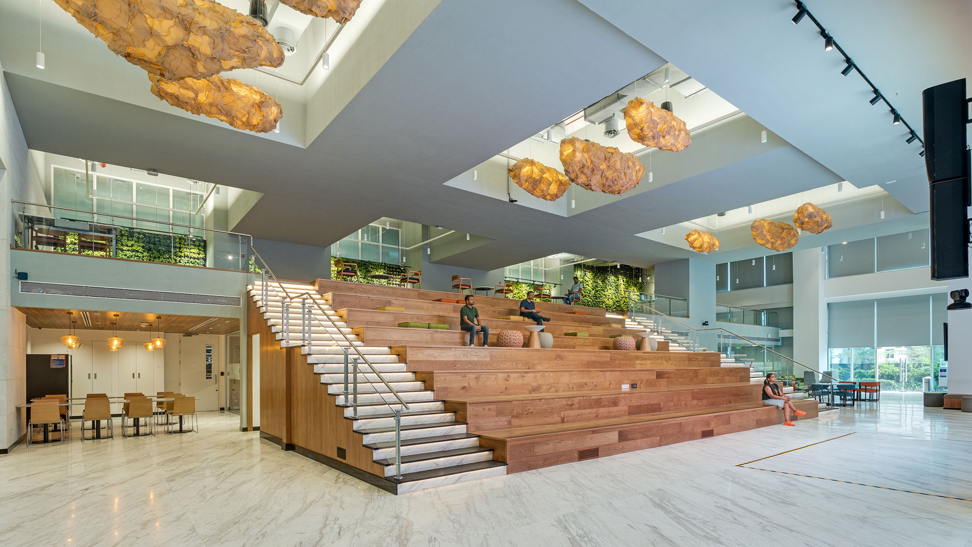 A large room with a large staircase.