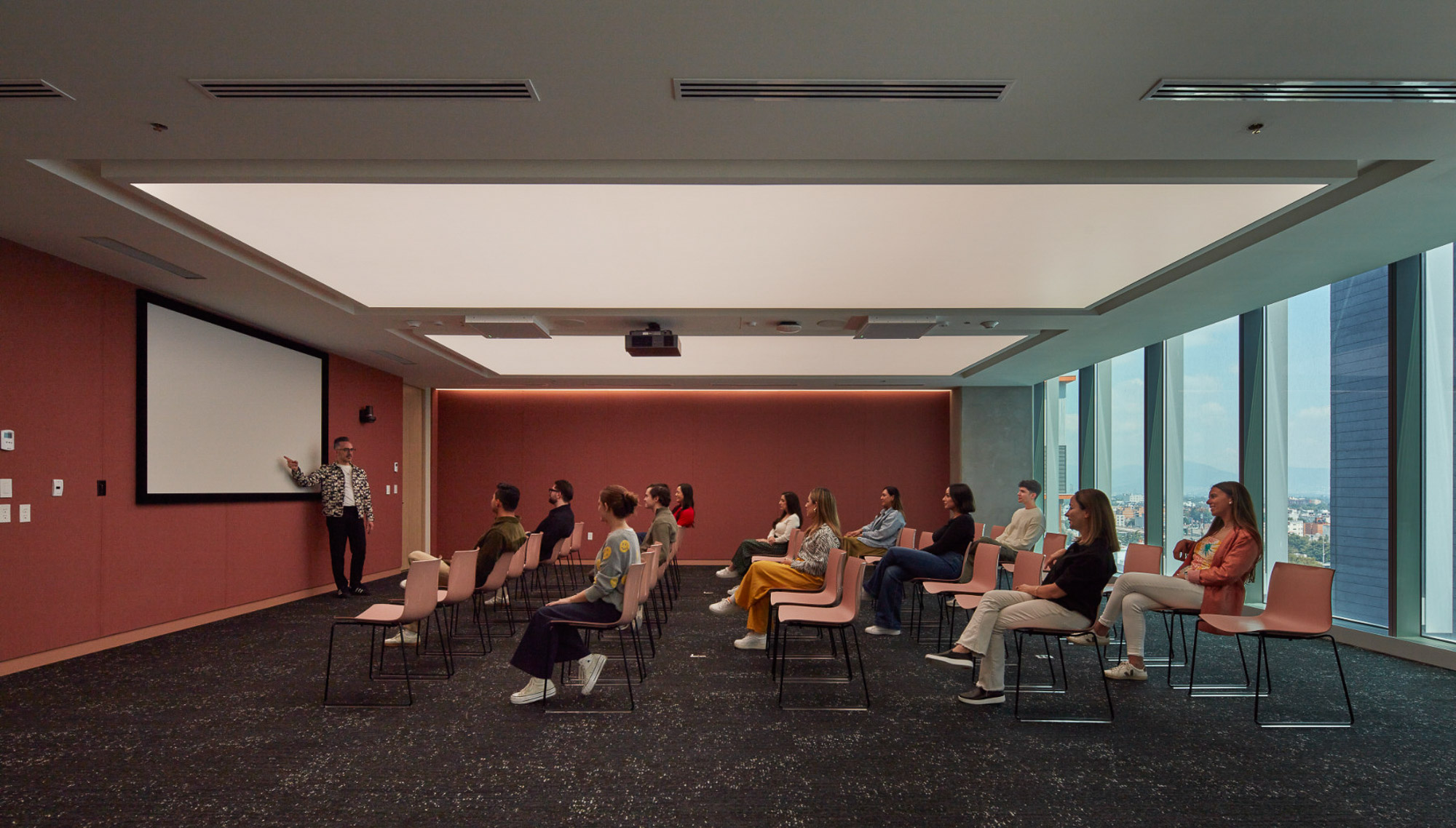 A group of people sitting in chairs.