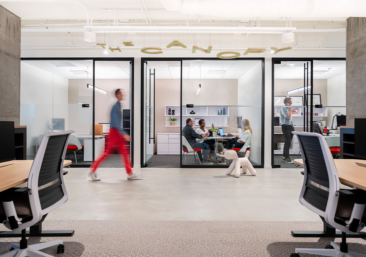A group of people in an office.
