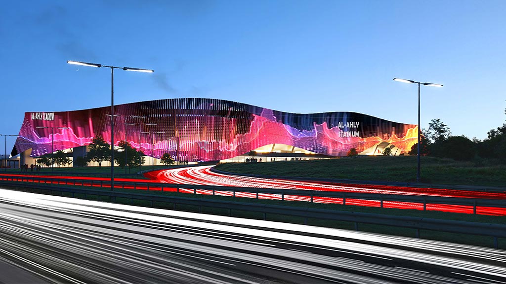 A stadium with a red track.
