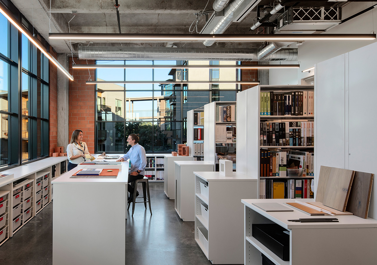 A man and a woman in an office.