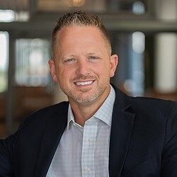 A man smiling for the camera.
