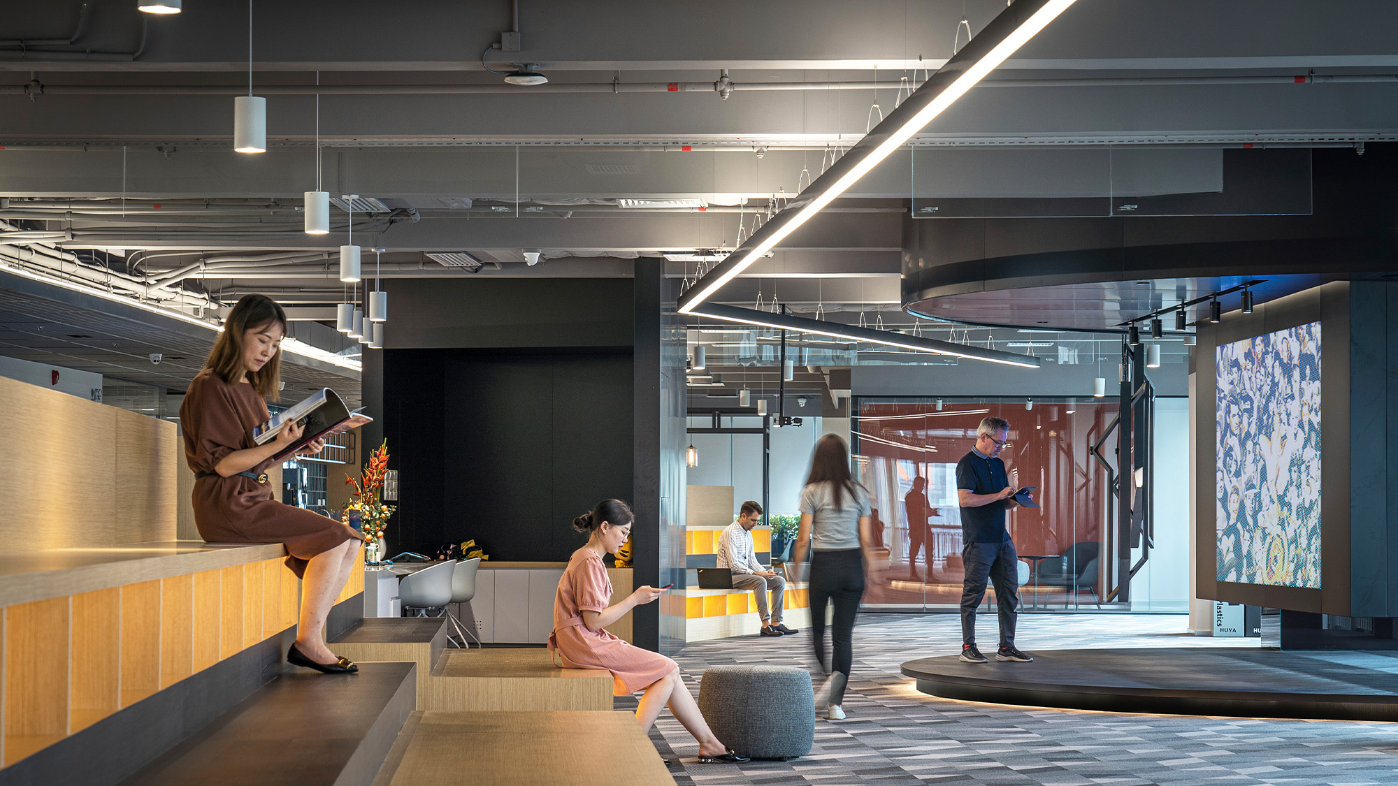 A group of people inside HUYA Headquarters, Guangzhou, China.