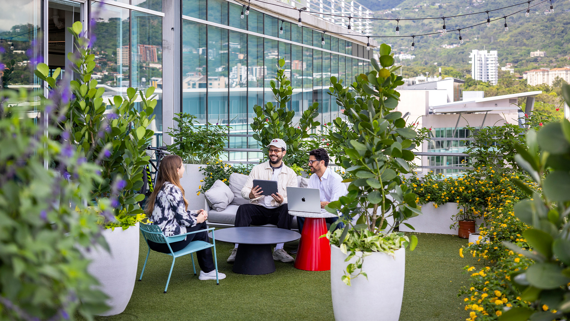 A group of people sitting outside.